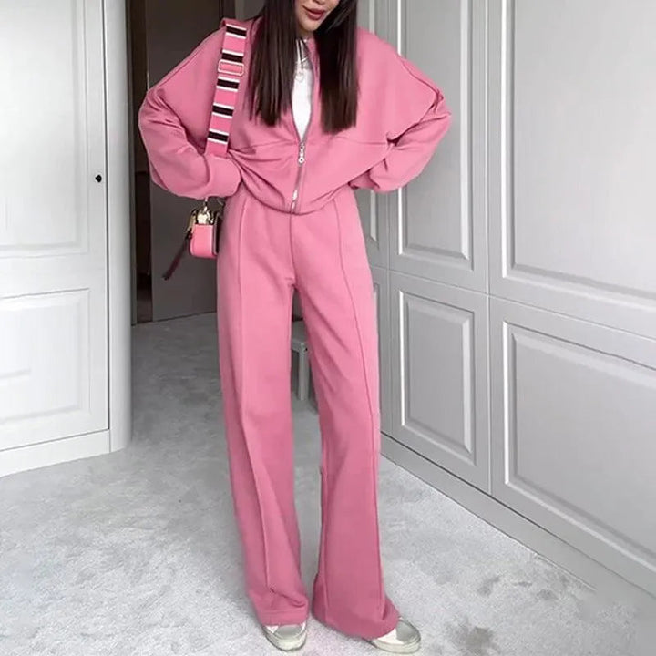 Levoire | Complété avec un pantalon décontracté et un pull zippé uni Rosa