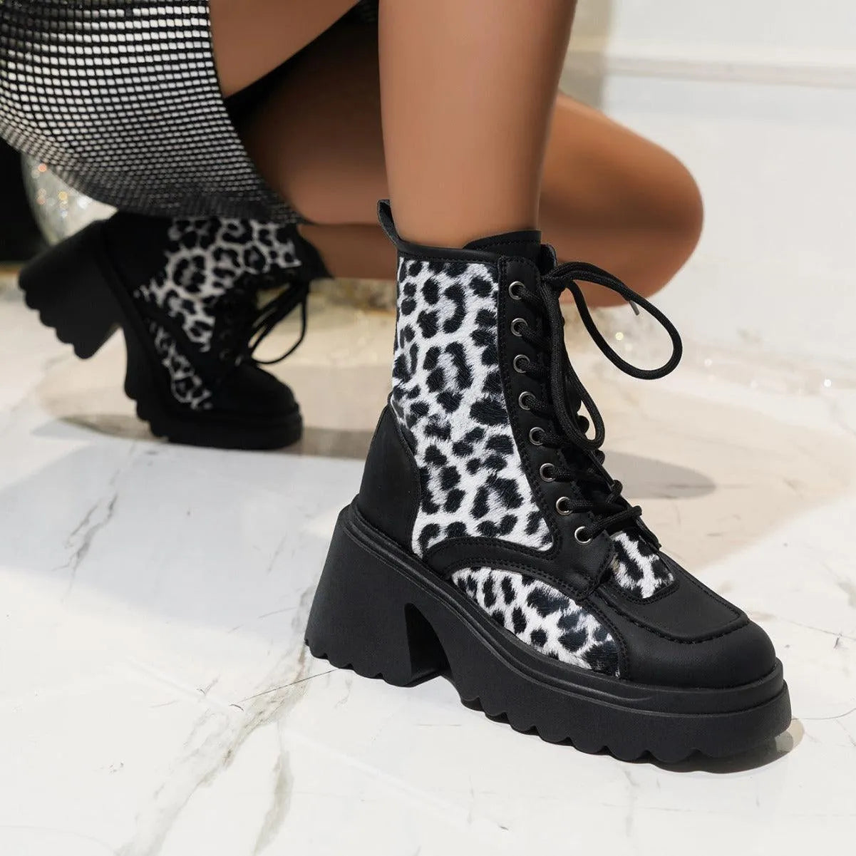 Levoire | Bottes à semelle épaisse et motifs léopard