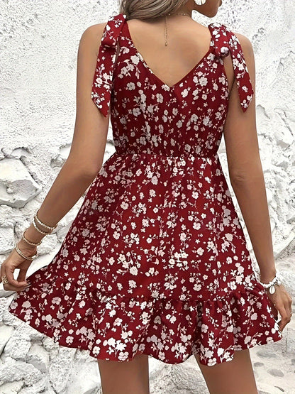 Levoire | Robe rouge à fleurs avec décolleté en V
