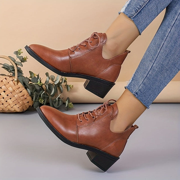 Levoire | Bottes Unies Élégantes Avec Lacets Et Talons