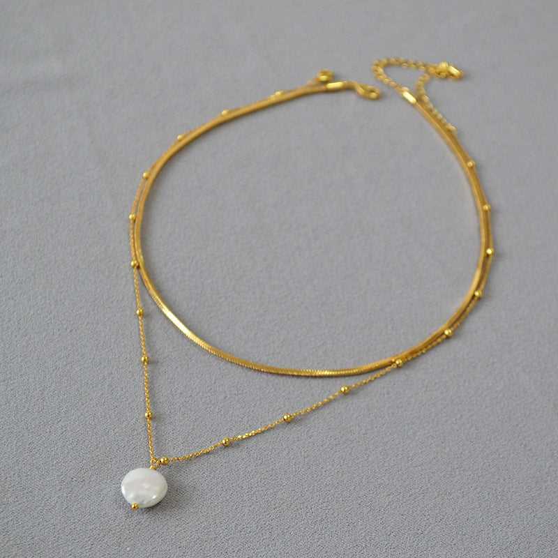Levoire | Collier Baroque Décoré Avec Des Anneaux