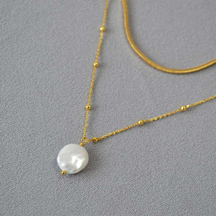 Levoire | Collier Baroque Décoré Avec Des Anneaux
