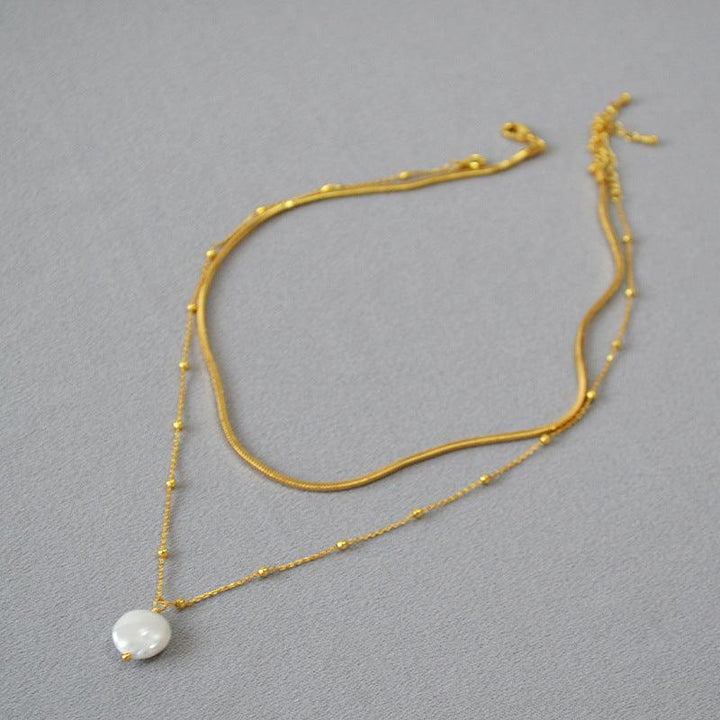 Levoire | Collier Baroque Décoré Avec Des Anneaux