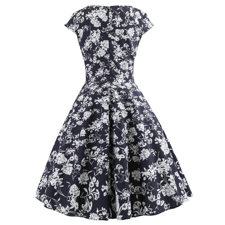Robe portefeuille pour femmes avec un design floral élégant et une coupe flatteuse Levoire