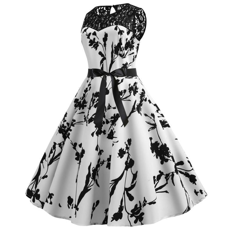 Robe vintage femme en A avec haut en dentelle et ceinture à nouer Levoire
