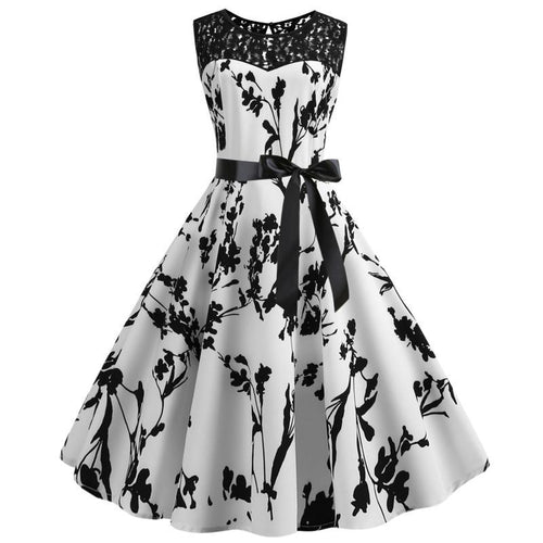 Robe vintage femme en A avec haut en dentelle et ceinture à nouer Levoire