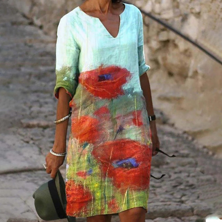Levoire | Robe Élégante À Imprimé Fleuris Bleu avec des fleurs orange