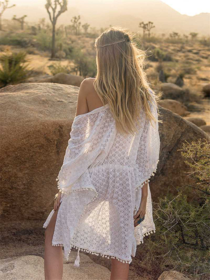 Tunique de plage pour femmes avec des motifs en crochet délicats et des pompons Levoire