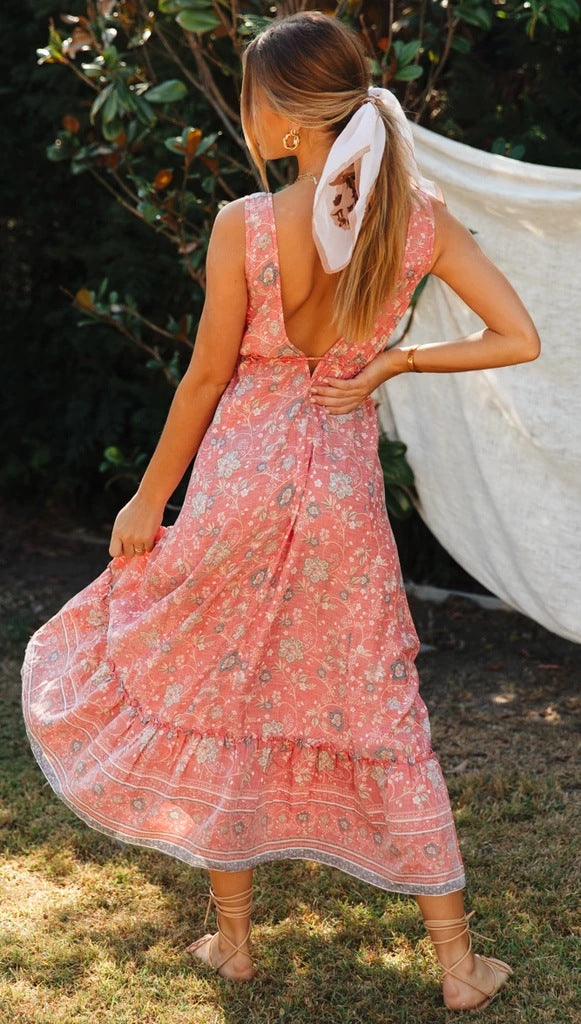 Robe maxi pour femmes avec un motif floral ludique et un décolleté en V profond Levoire