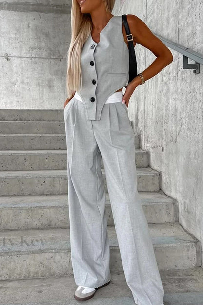 Levoire | Style Britannique Décontracté Boutons Unis Pli Asymétrique Décolleté En V Sans Manches Deux Pièces