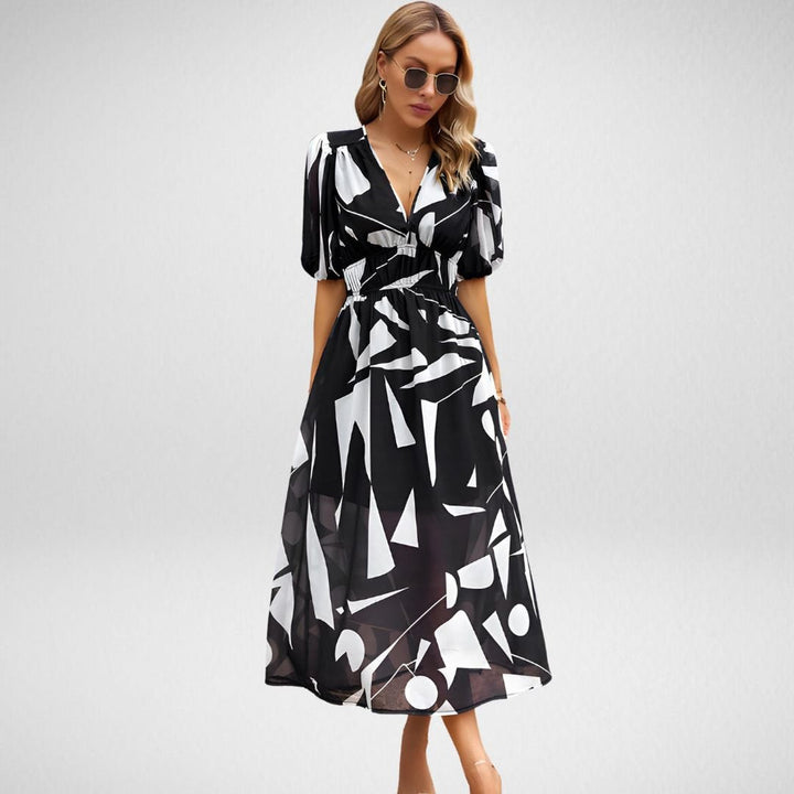 Levoire | Robe Midi Avec Décolleté Remarqué Et Manches Courtes Bouffantes Avec Imprimé Abstrait Noir
