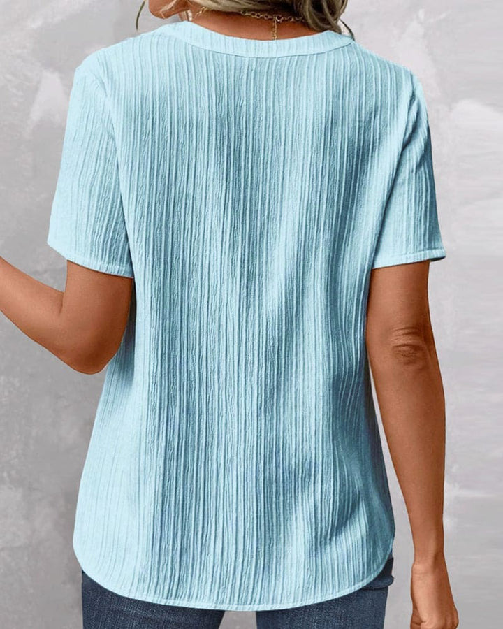 Levoire | T-Shirt Uni À Col En V Pour Un Style Décontracté
