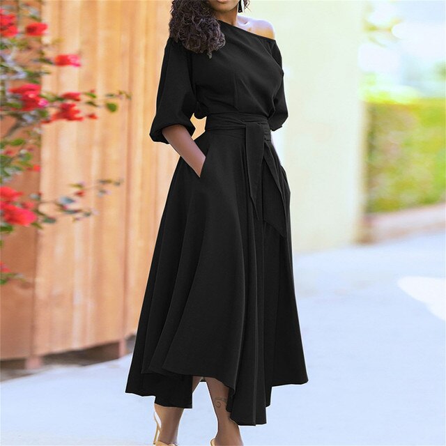 Levoire | Une Élégante Robe Midi À Manches Jusqu'Au Coude Et Avec Un Lien De Taille Réglable Noir