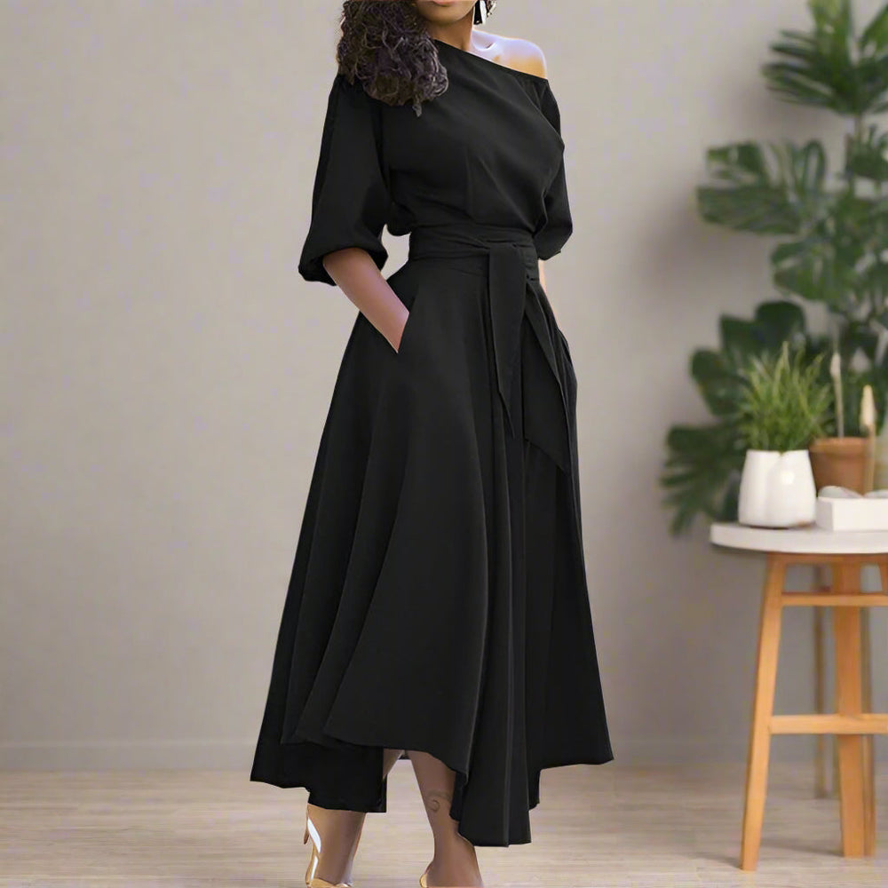 Levoire | Une Élégante Robe Midi À Manches Jusqu'Au Coude Et Avec Un Lien De Taille Réglable
