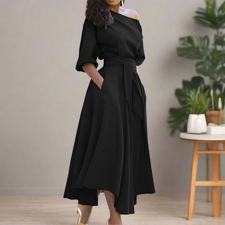 Levoire | Une Élégante Robe Midi À Manches Jusqu'Au Coude Et Avec Un Lien De Taille Réglable