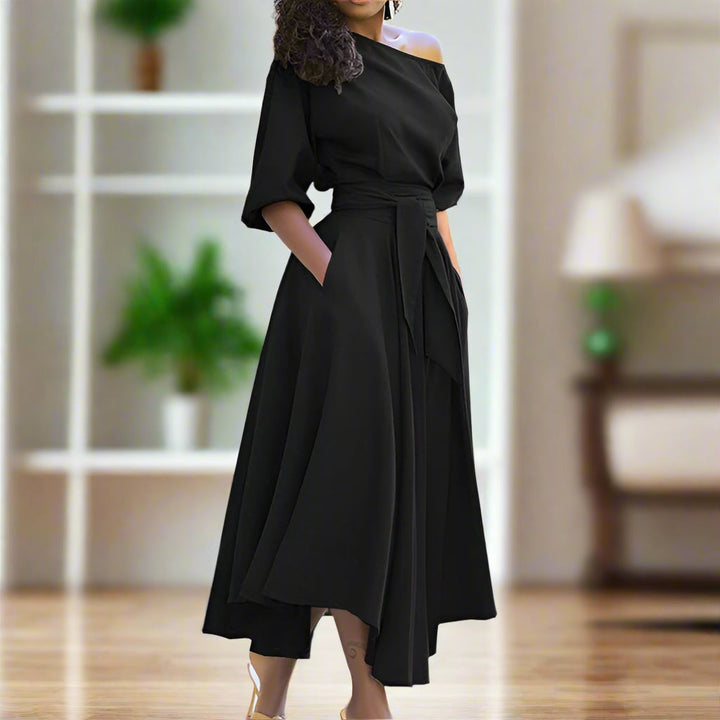 Levoire | Une Élégante Robe Midi À Manches Jusqu'Au Coude Et Avec Un Lien De Taille Réglable