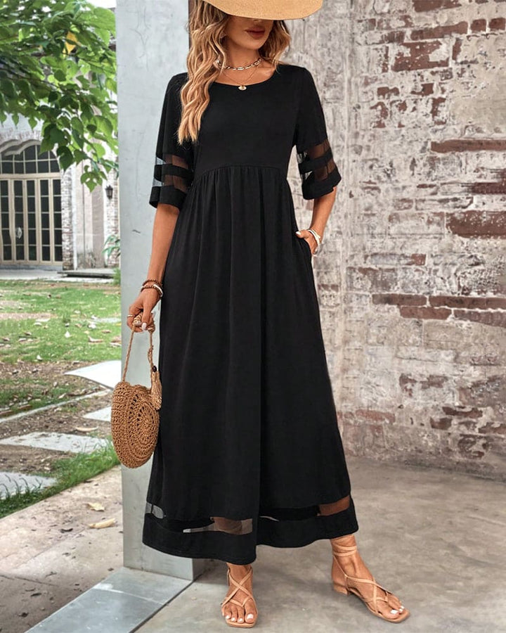 Levoire | Robe Élégante À Manches Plus Courtes Et Un Décolleté Rond Décontracté Noir