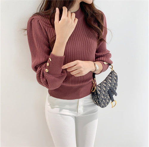 Pull en tricot pour femme avec des détails de boutons élégants Levoire