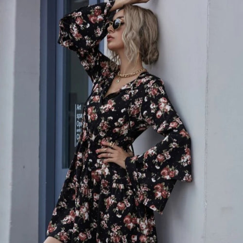 Robe midi femme avec des manches évasées larges et des motifs floraux Levoire