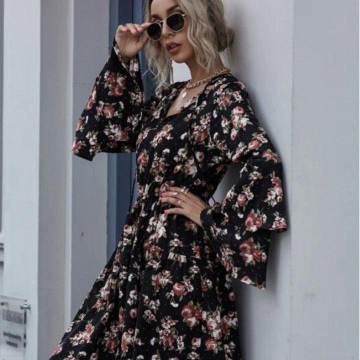 Robe midi femme avec des manches évasées larges et des motifs floraux Levoire