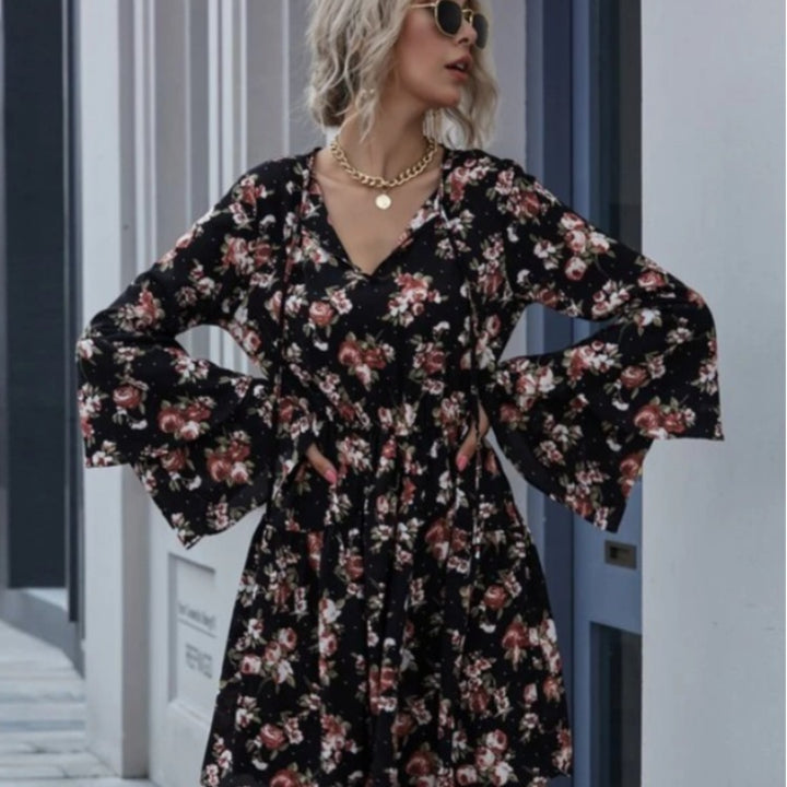 Robe midi femme avec des manches évasées larges et des motifs floraux Levoire