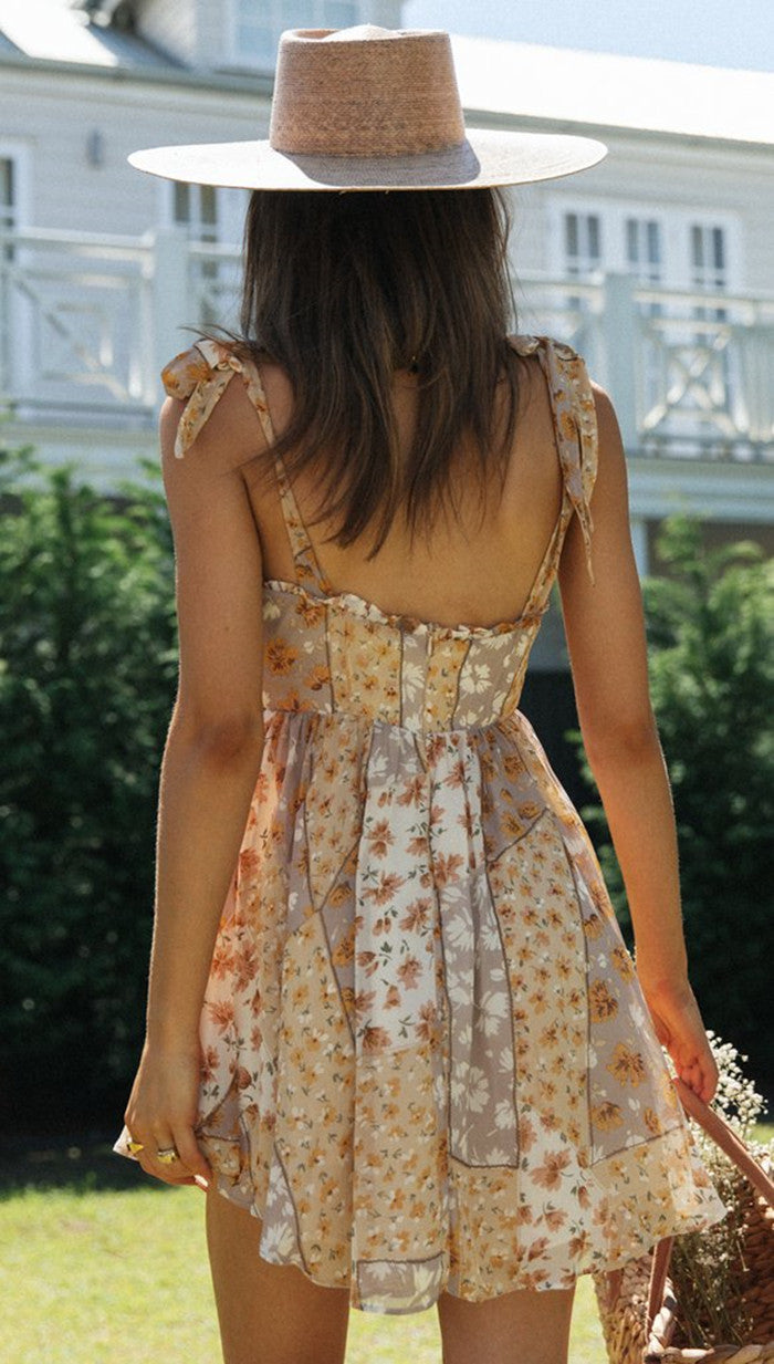Robe d'été aérienne pour femmes avec un motif floral ludique et des bretelles spaghetti Levoire