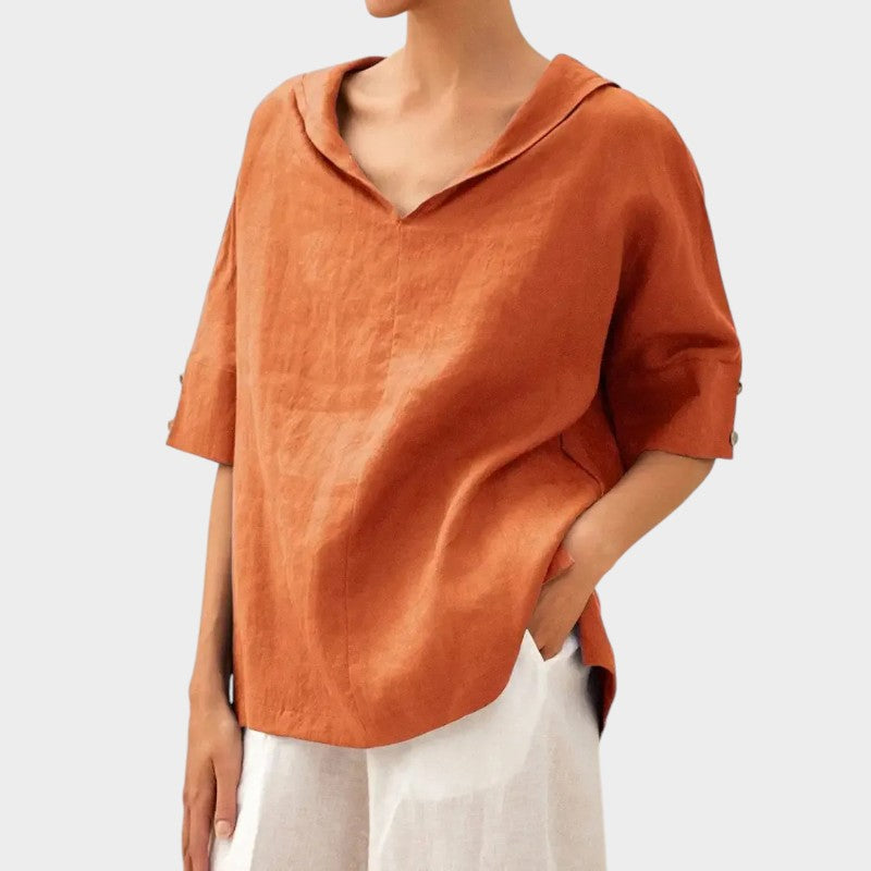 Levoire | Élégante Blouse Avec Des Détails De Bouton Discrets Orange
