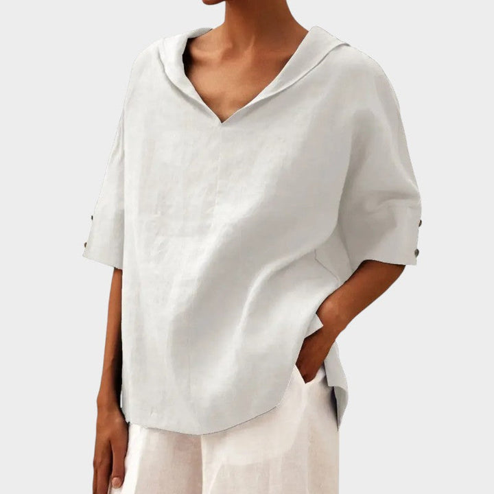 Levoire | Élégante Blouse Avec Des Détails De Bouton Discrets Blanc