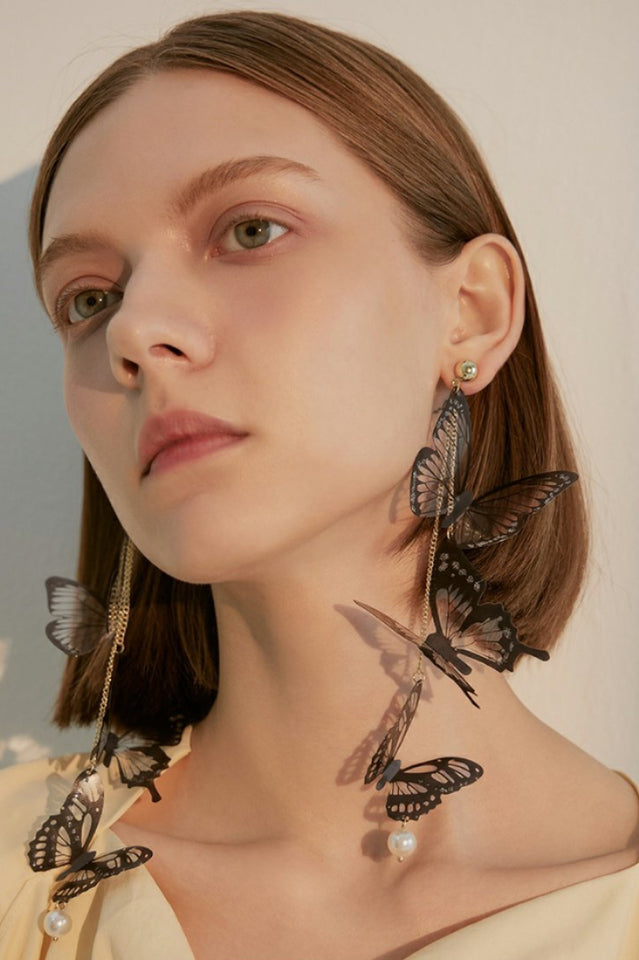 Levoire | Boucles D'Oreilles Longues Avec Un Pendentif En Forme De Papillon