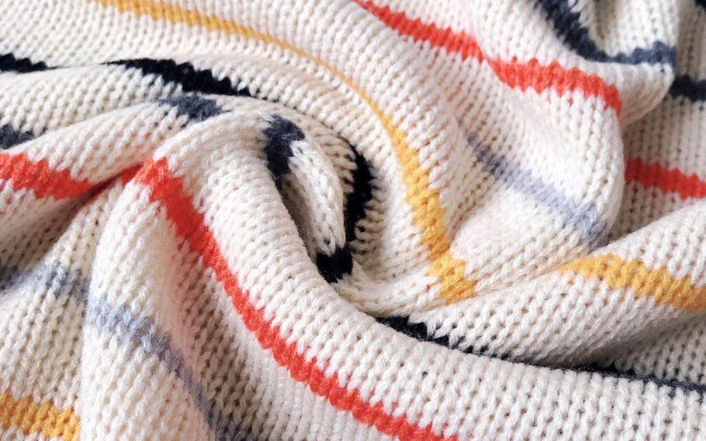 Levoire | Un Pull À Une Épaule Avec Un Motif Coloré