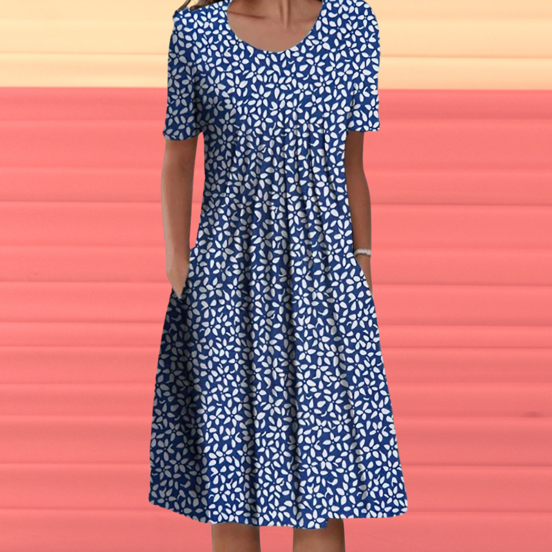 Levoire | Robe avec des manches courtes et un motif floral Bleu avec des fleurs blanches