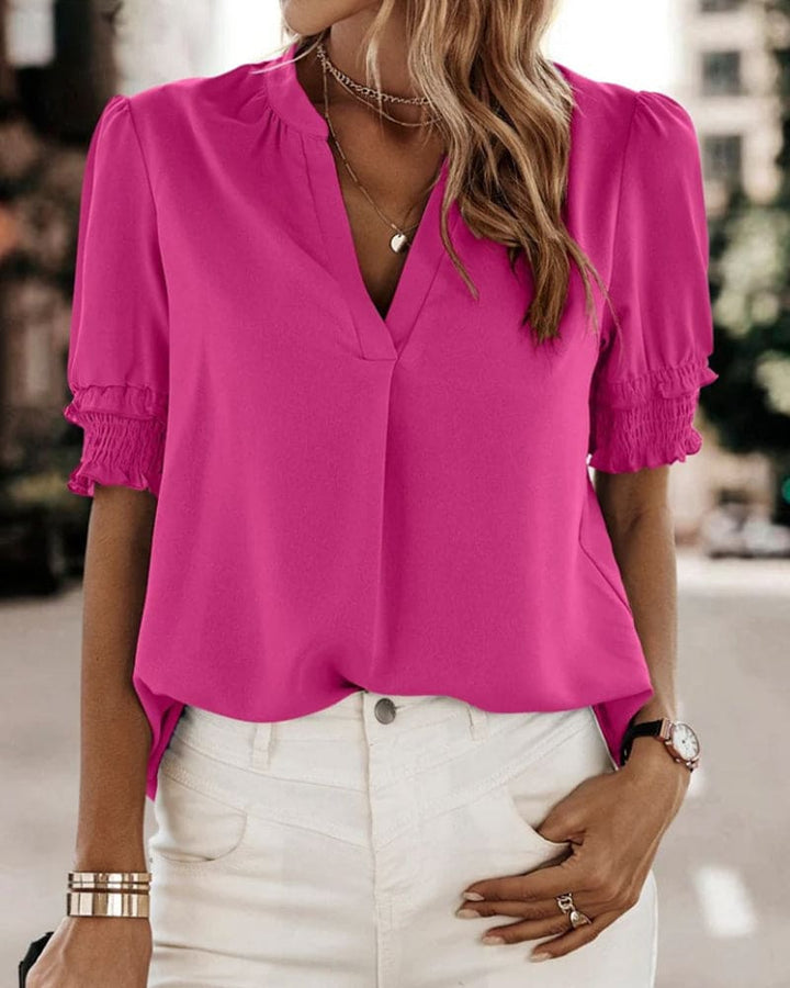 Levoire | Chic Top À Manches Courtes Bouffantes Avec Col En V Dans Un Style Classique Rosa