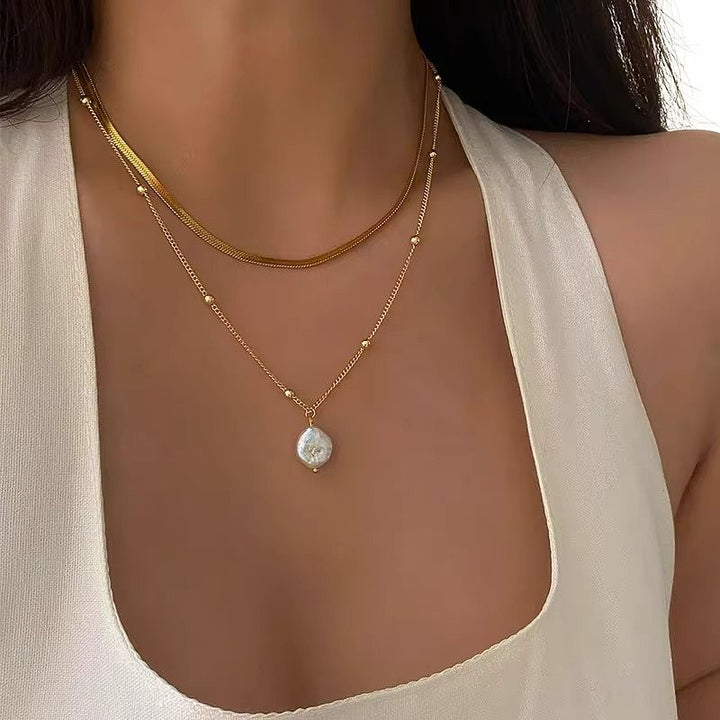 Levoire | Collier Baroque Décoré Avec Des Anneaux