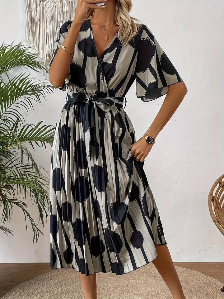 Levoire | Élégante Robe Midi À Manches Courtes Avec Imprimé Intégral