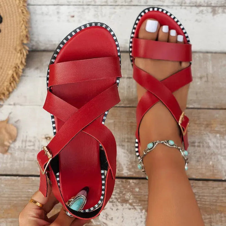 Levoire | Sandales romaines avec design de lanière croisée Rot