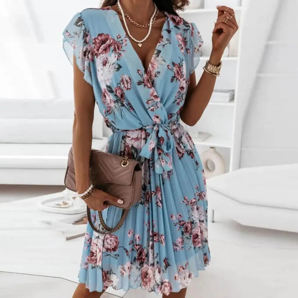 Levoire | Robe Avec Motif Floral Et Décolleté Accentué Pour Un Style Élégant Bleu
