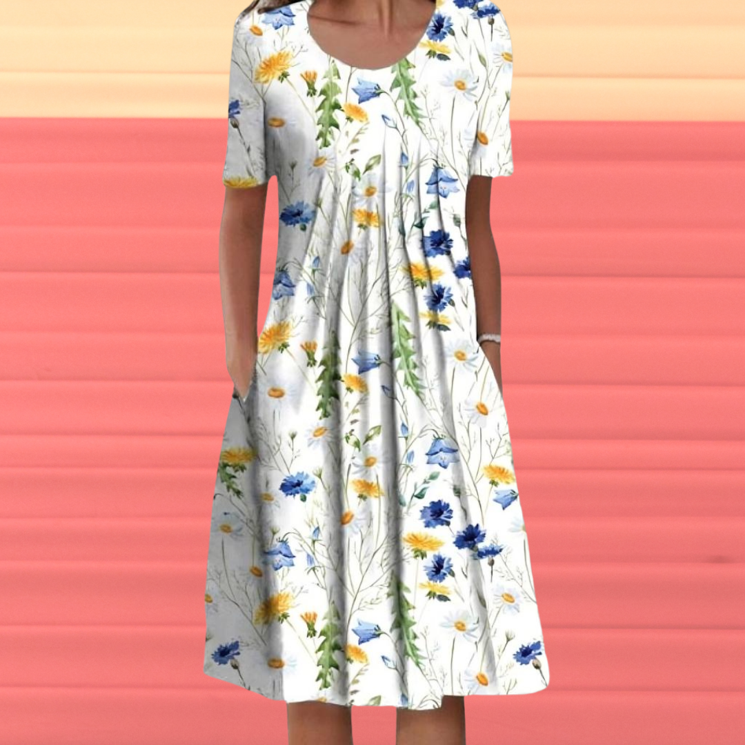 Levoire | Robe avec des manches courtes et un motif floral Robe blanche avec des fleurs