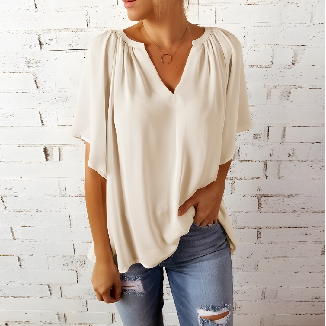 Levoire | Blouse Élégante Avec Col En V Et Manches Courtes Beige