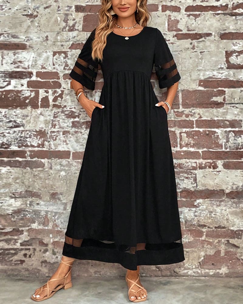 Levoire | Robe Élégante À Manches Plus Courtes Et Un Décolleté Rond Décontracté