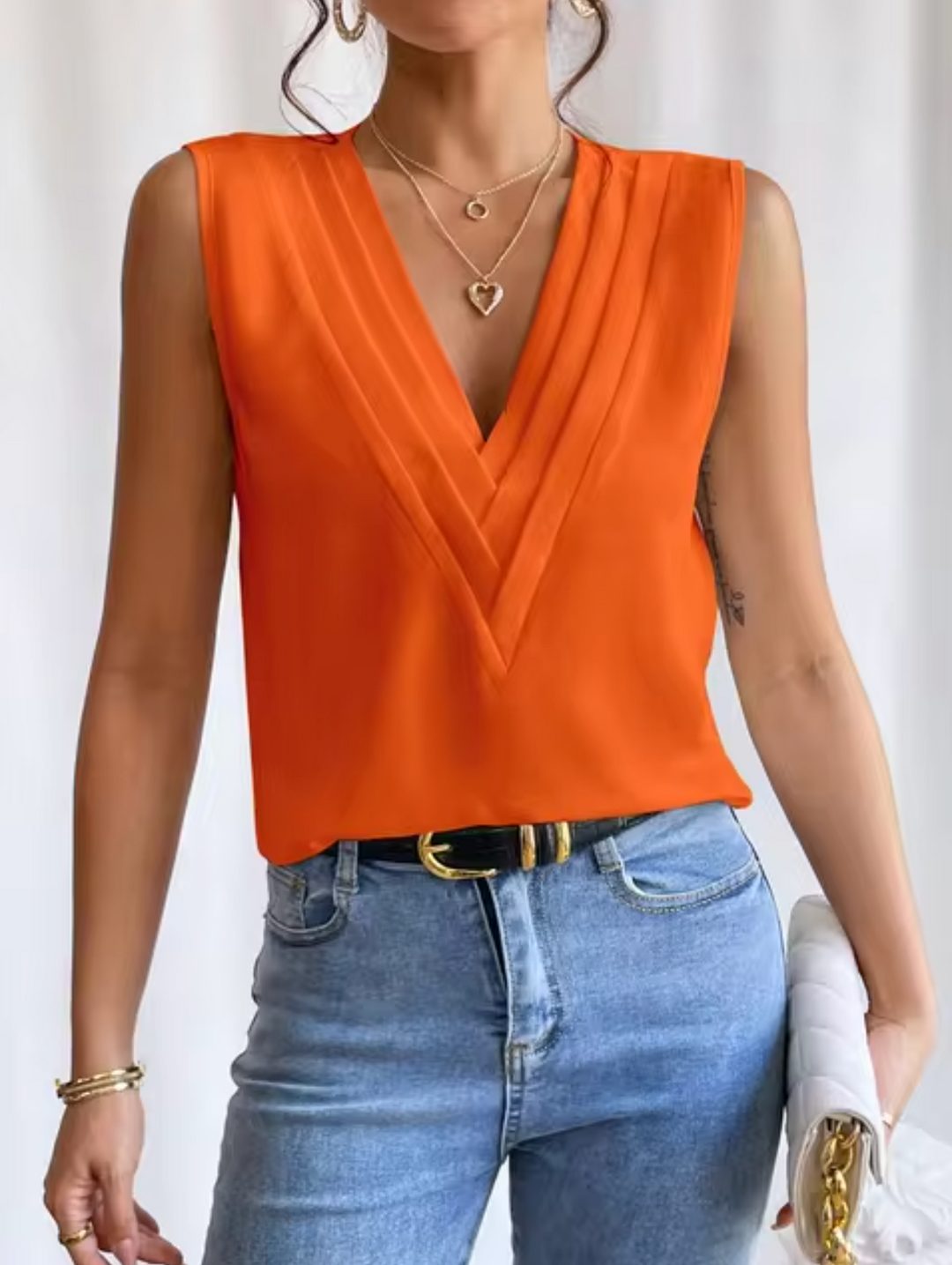 Levoire | Top Élégant Sans Manches Avec Décolleté En V Orange