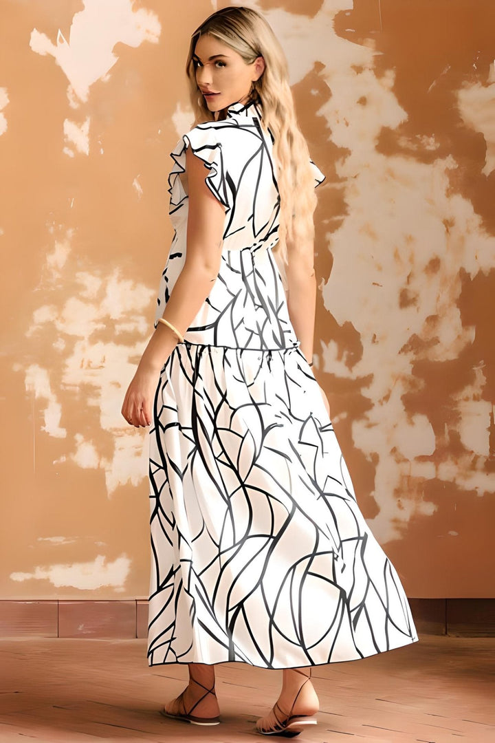 Levoire | Sofisticado vestido largo con volantes L