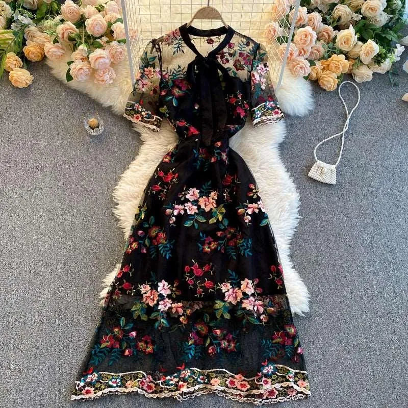 Levoire | Robe à manches courtes avec cordons Noir