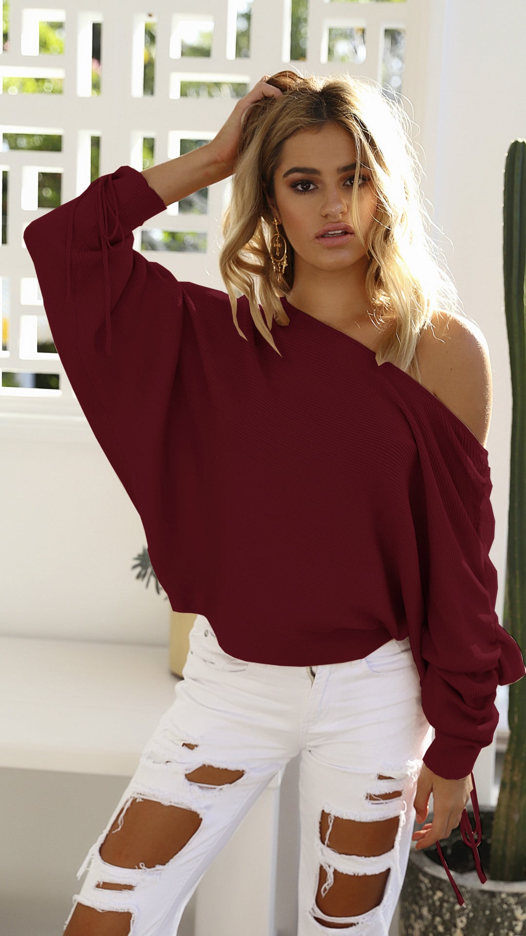 Sweater femme oversize avec coupe asymétrique et détails décontractés Levoire