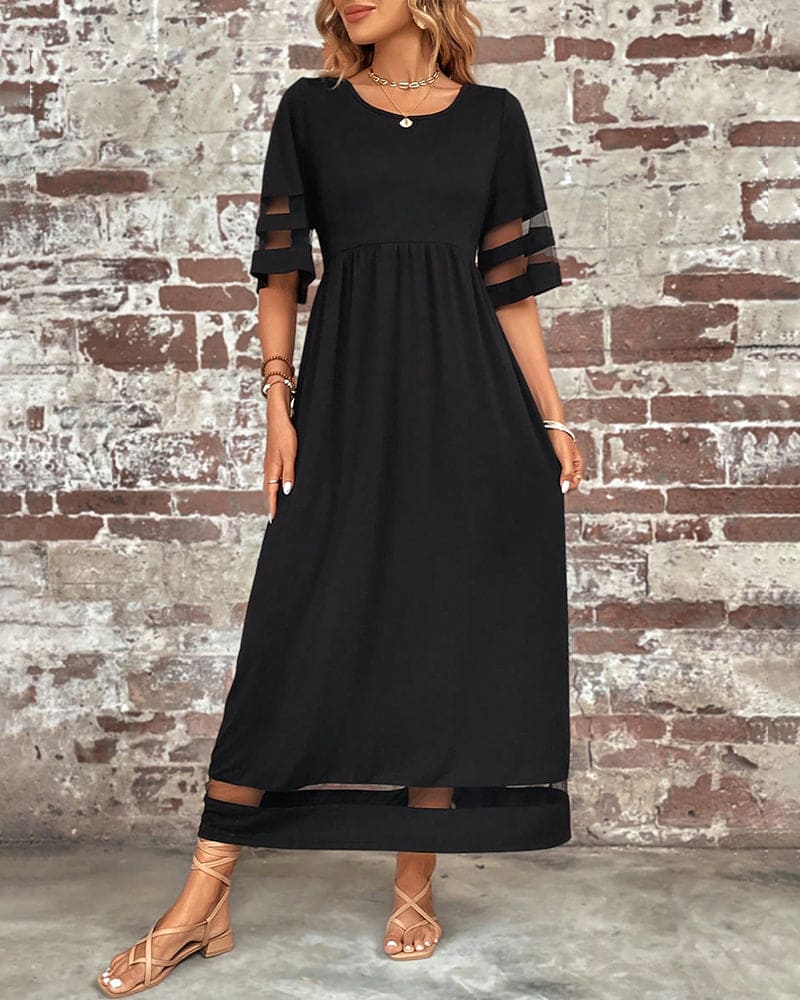 Levoire | Robe Élégante À Manches Plus Courtes Et Un Décolleté Rond Décontracté