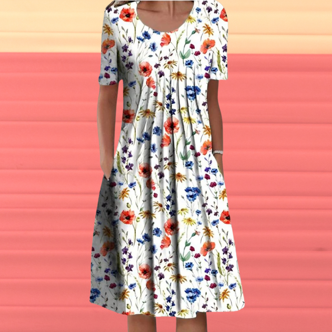 Levoire | Robe avec des manches courtes et un motif floral Blanc avec des fleurs rouges