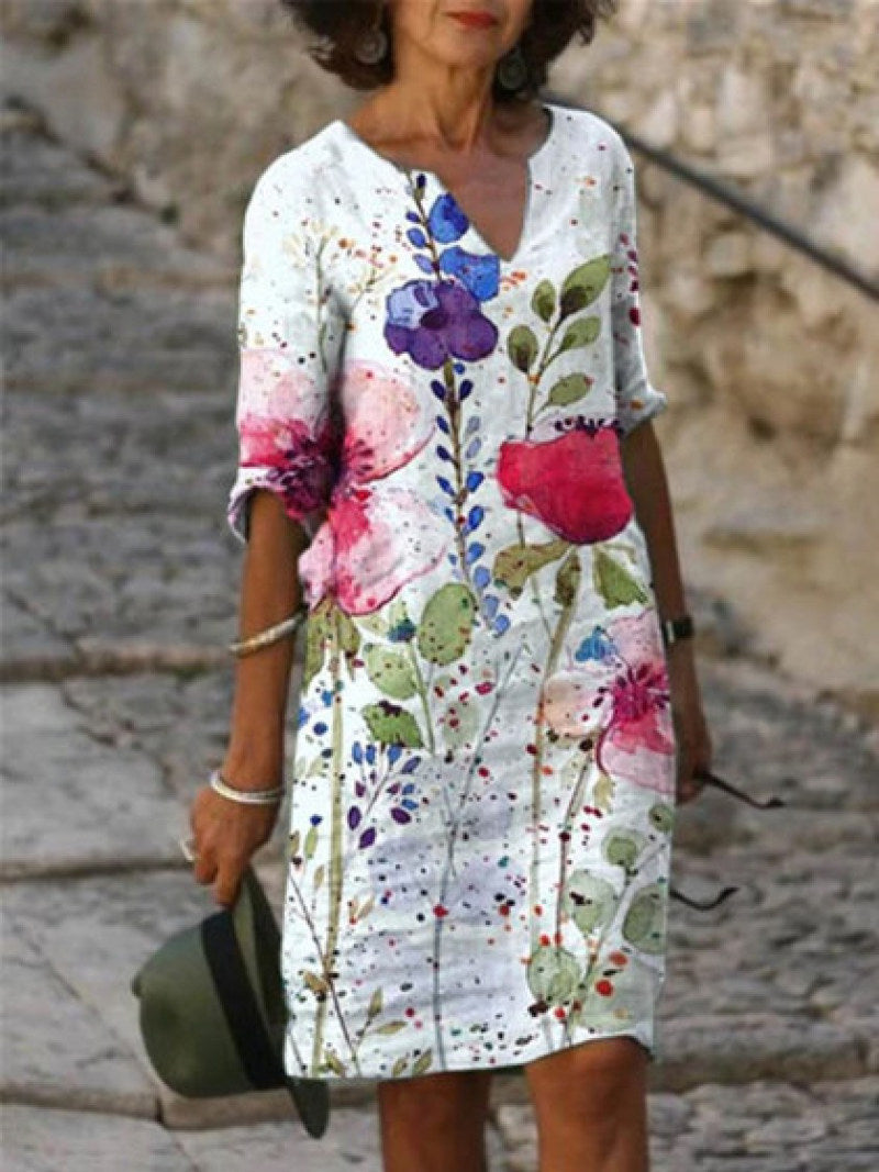 Levoire | Robe Élégante À Imprimé Fleuris Blanc avec des fleurs violettes