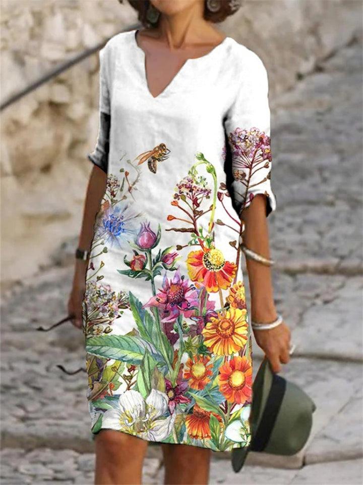 Levoire | Robe Élégante À Imprimé Fleuris Blanc avec des fleurs orange