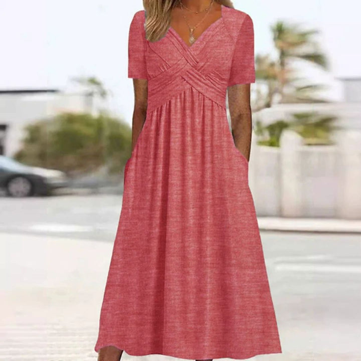Levoire | Robe Élégante À Décolleté En V Avec Taille Empire Et Poches Pour Dames Rosa