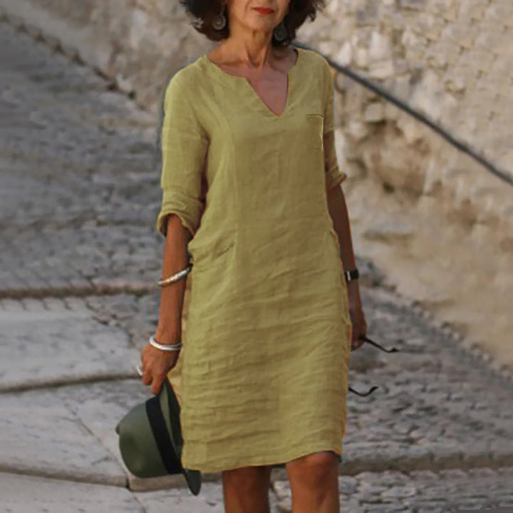 Levoire | Une Robe Gracieuse Beige