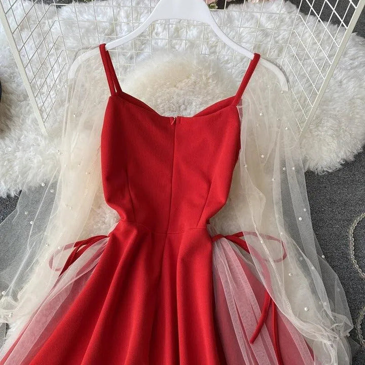 Levoire | Robe en forme A avec des bretelles bouffantes et un décolleté en V